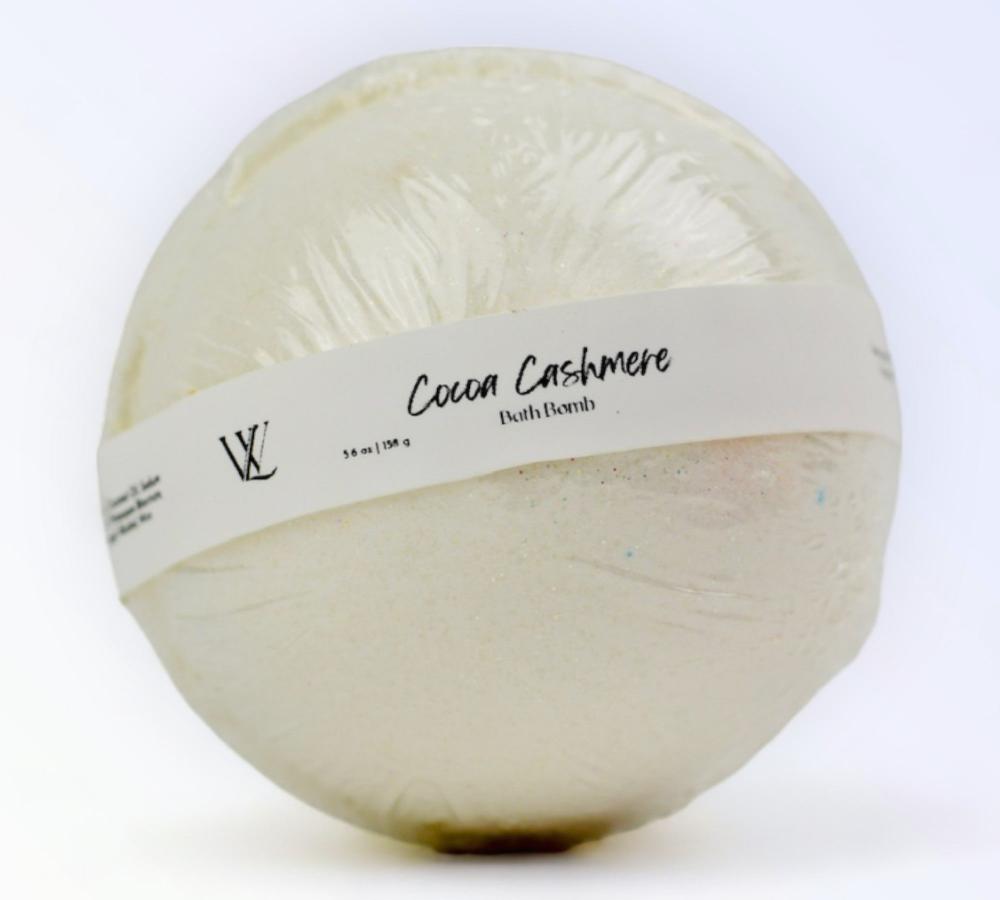 Cocoa Cashmere Organic Bath Bombs, part of your essential skin care routine, with warm spices, cedarwood, vanilla, and cocoa butter for a luxurious bath.