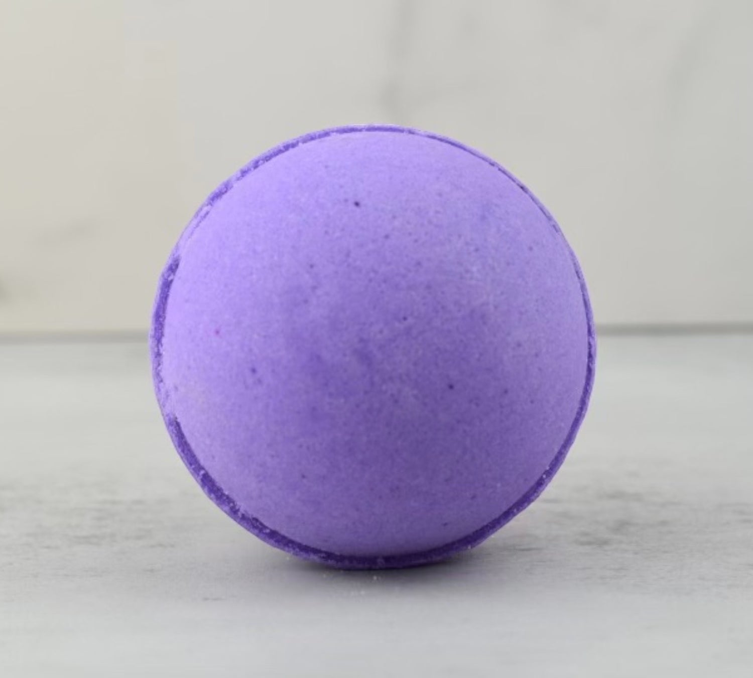 Lavender & Sandalwood Organic Bath Bombs, part of your essential skin care routine, with soothing lavender and nourishing ingredients for a relaxing bath.