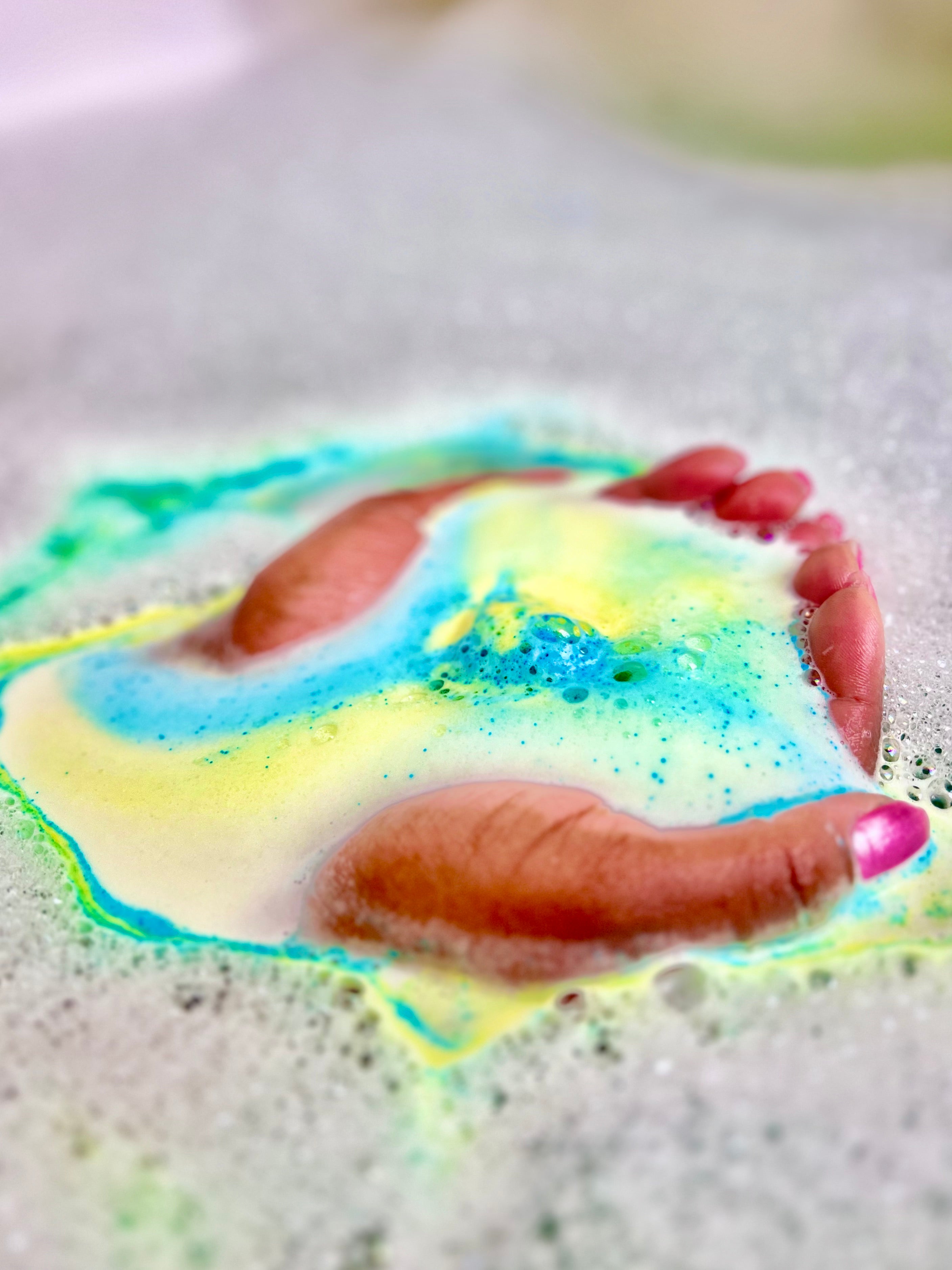 Using With Love's Essential Skin Care Bathbomb to relax and clean skin.