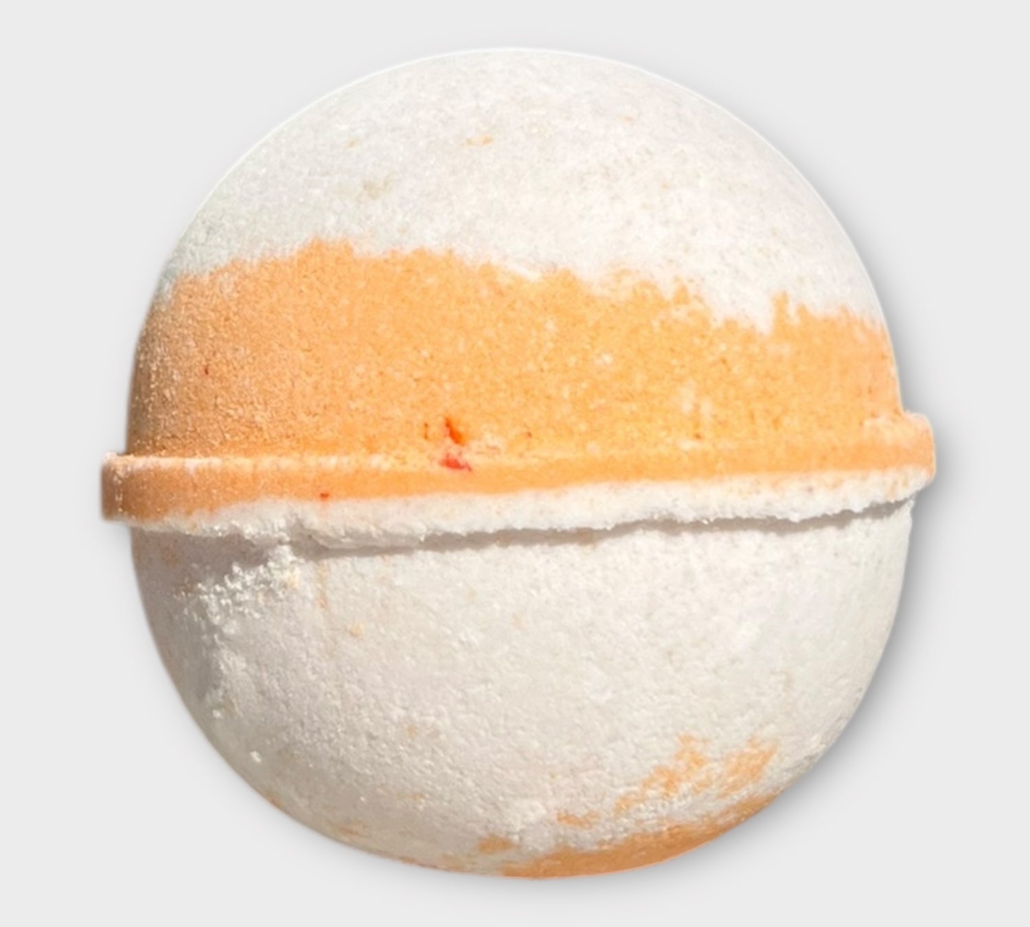 With Love Autumn Radiance Organic Bath Bomb, part of your essential skin care routine, with notes of cinnamon, pumpkin, and sandalwood for a relaxing bath experience.