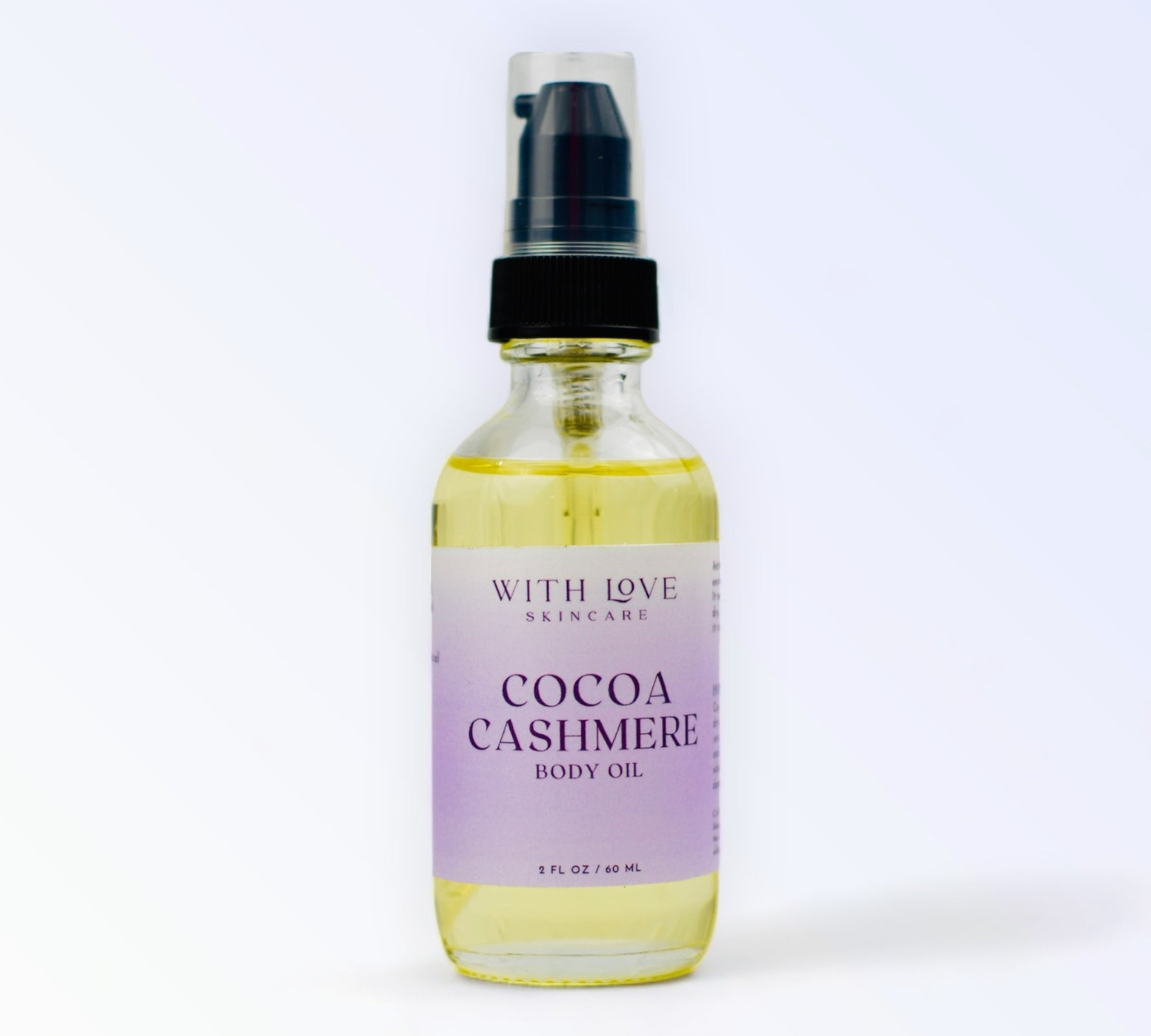 Cocoa Cashmere Natural Body Oil, part of your essential skin care routine, infused with cedarwood, vanilla, and cocoa butter for nourished, glowing skin.