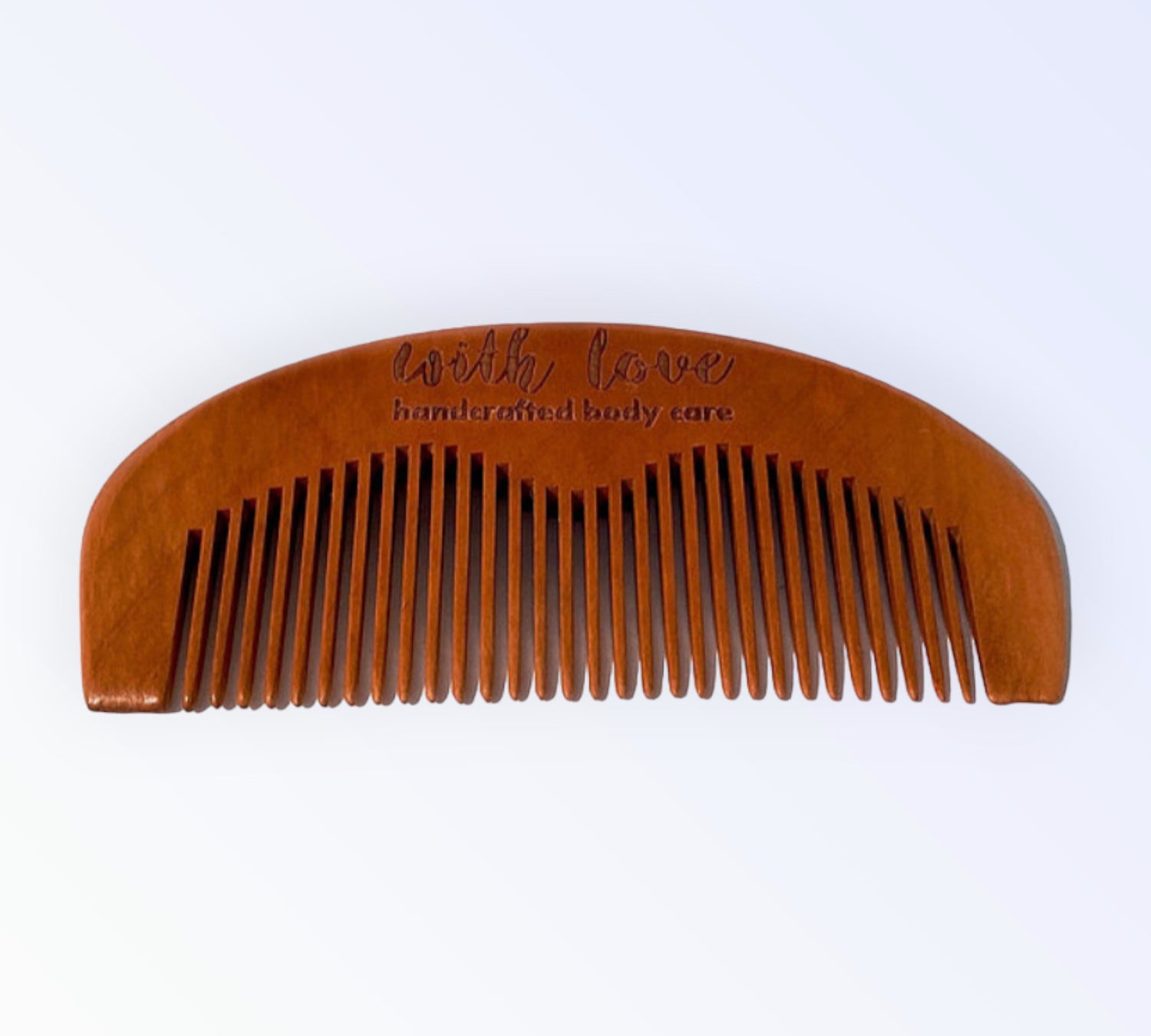 With Love anti-static beard comb made from biodegradable materials, splinter-free and water-resistant, perfect for grooming all hair types.