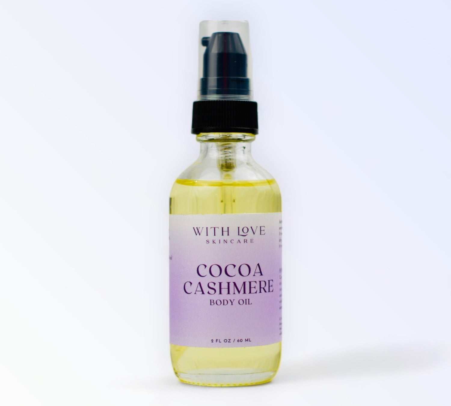 With Love Cocoa Cashmere Body Oil, part of your essential skin care routine, infused with cedarwood, vanilla, and cocoa butter for nourished, glowing skin.