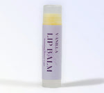 With Love Essential Skin Care Lip Balm with vegan formula, available in Mint or Vanilla for soft and nourished lips.