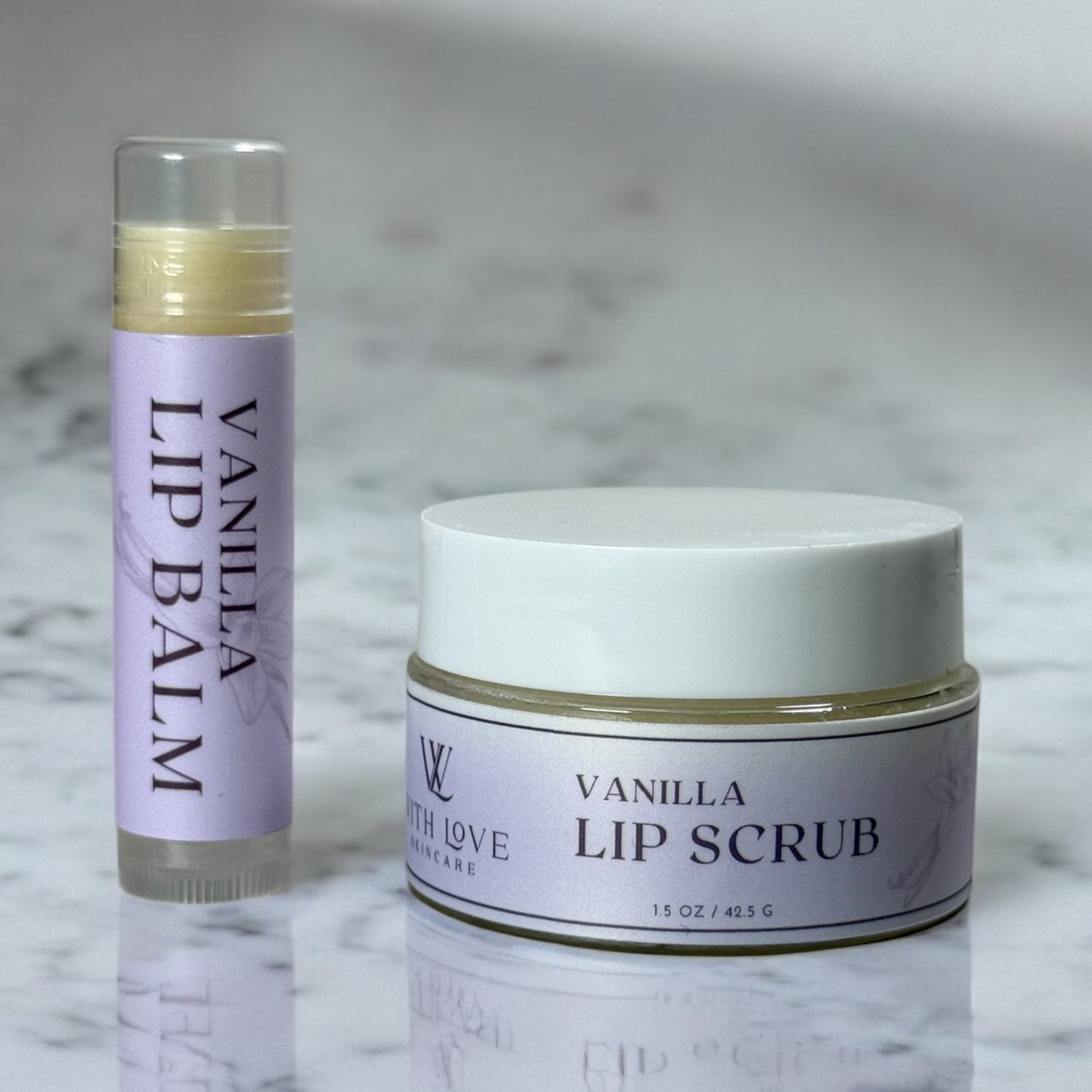 With Love Essential Skin Care Lip Care with exfoliating lip scrub and hydrating lip balm in vanilla for smooth, soft lips.