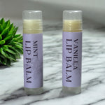 With Love Essential Skin Care Lip Balm with natural formula, available in Mint or Vanilla for soft and nourished lips.